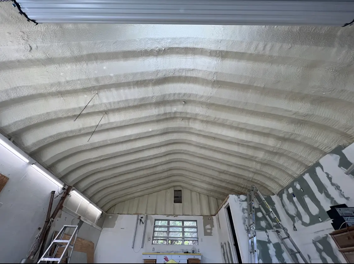Spray polyurethane foam applied to the underside of a metal roof deck in Hamptonburgh